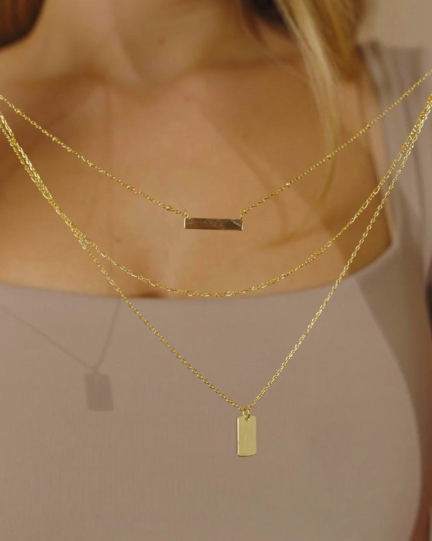 Girl Wearing Triple Layered Bar Necklace