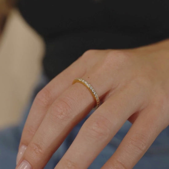 Woman Wearing Gold Thin CZ Band Ring