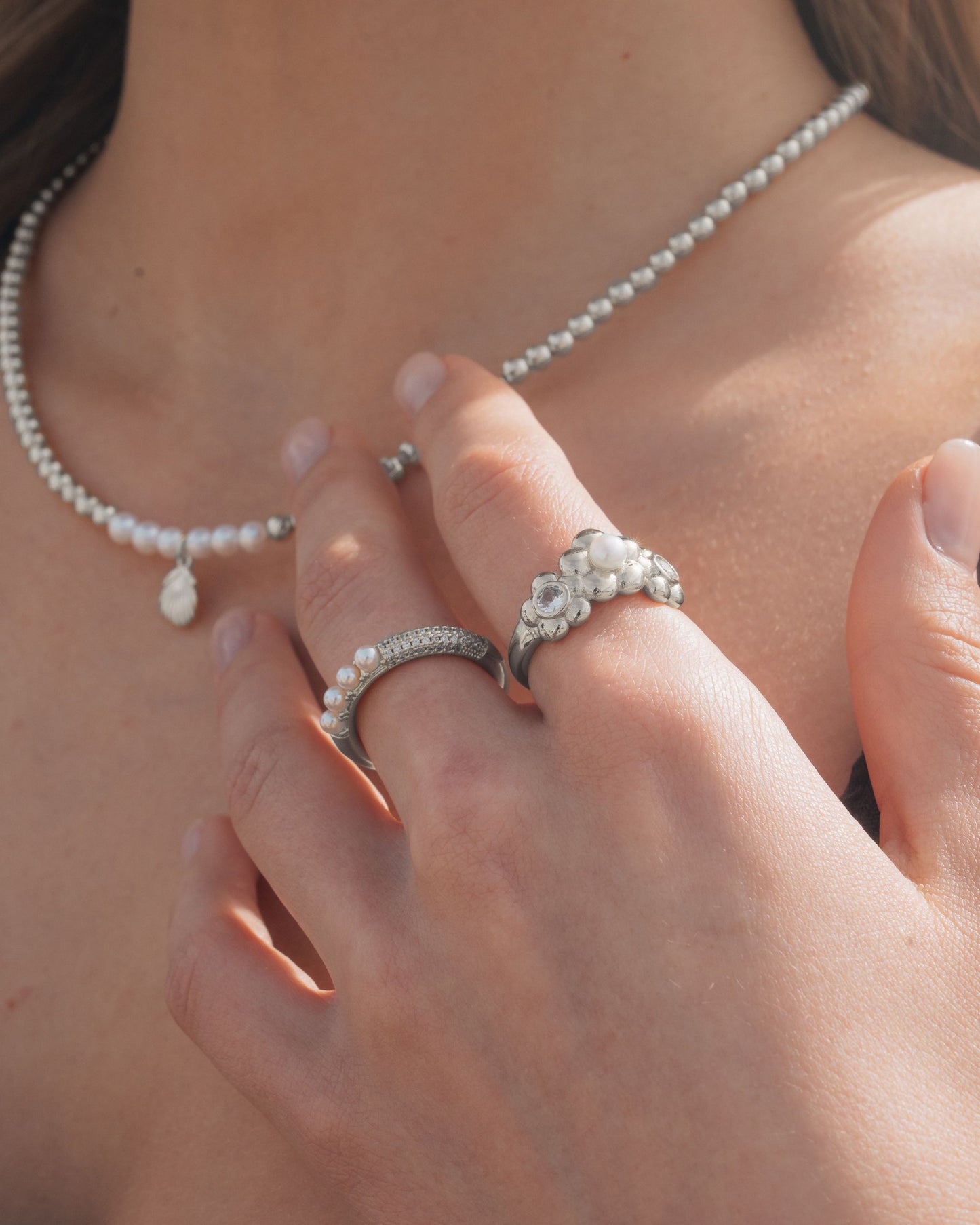 girl Wearing together Silver Necklace and ring