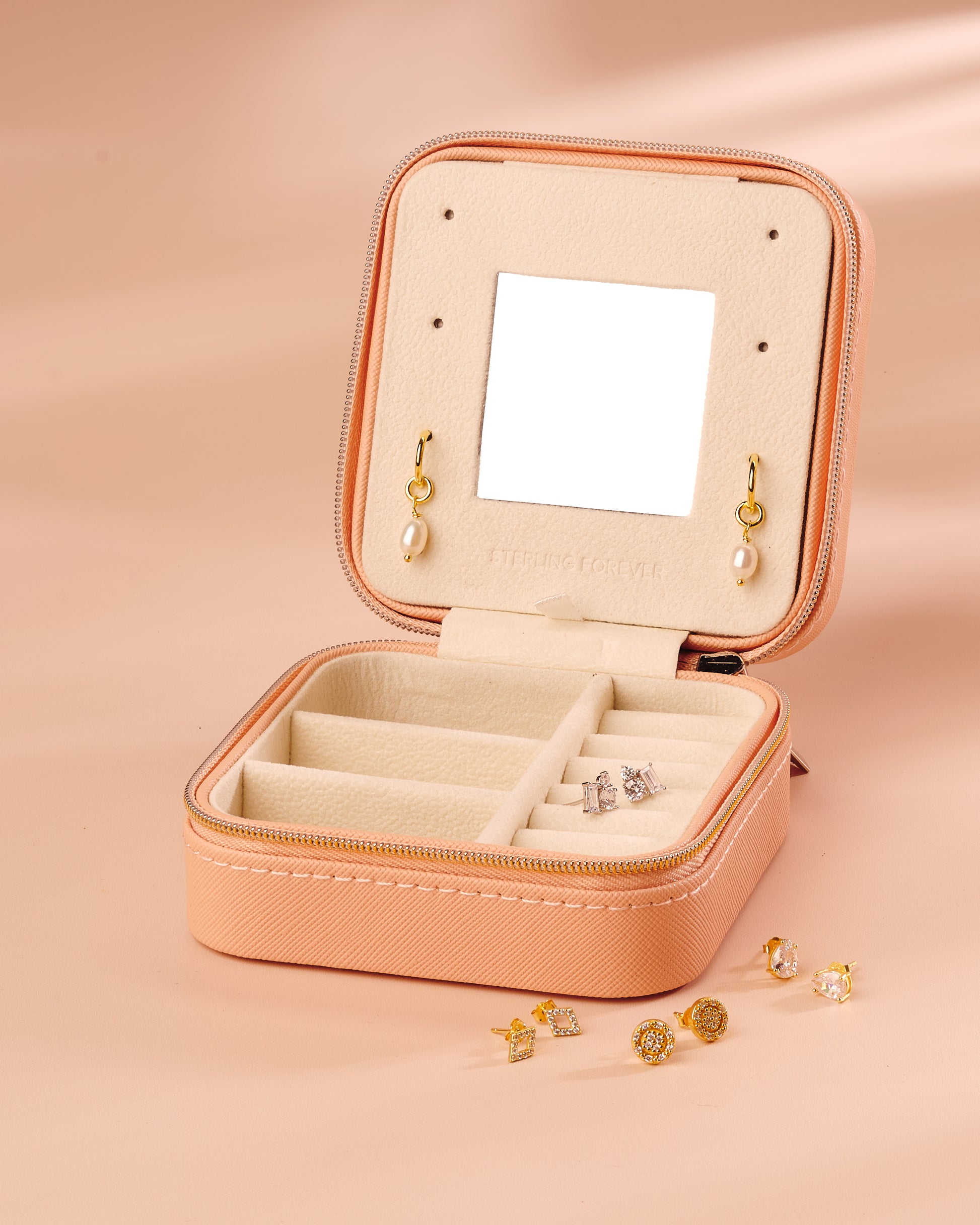 jewelry case with gold earring bundle