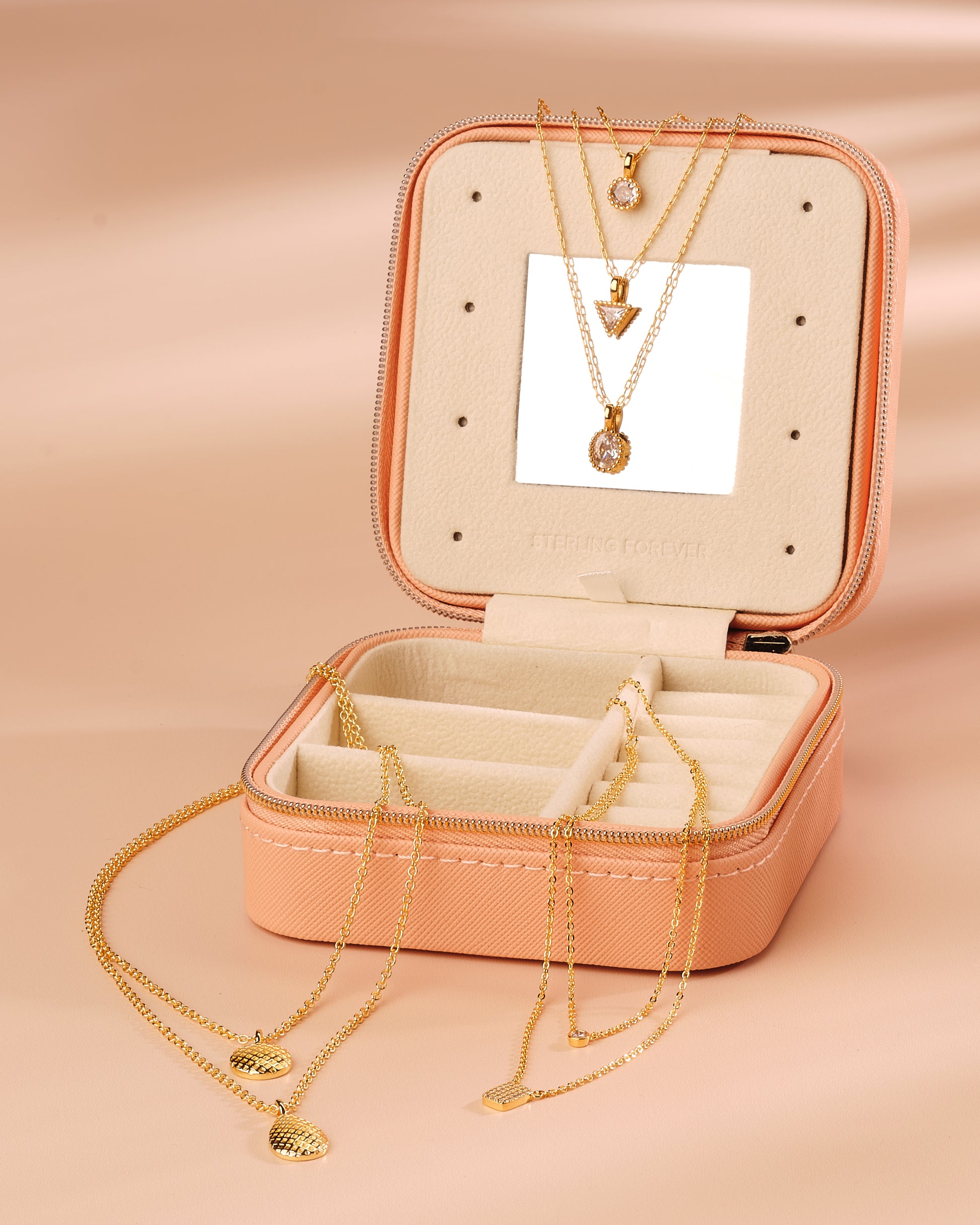 jewelry case with Layered gold necklace