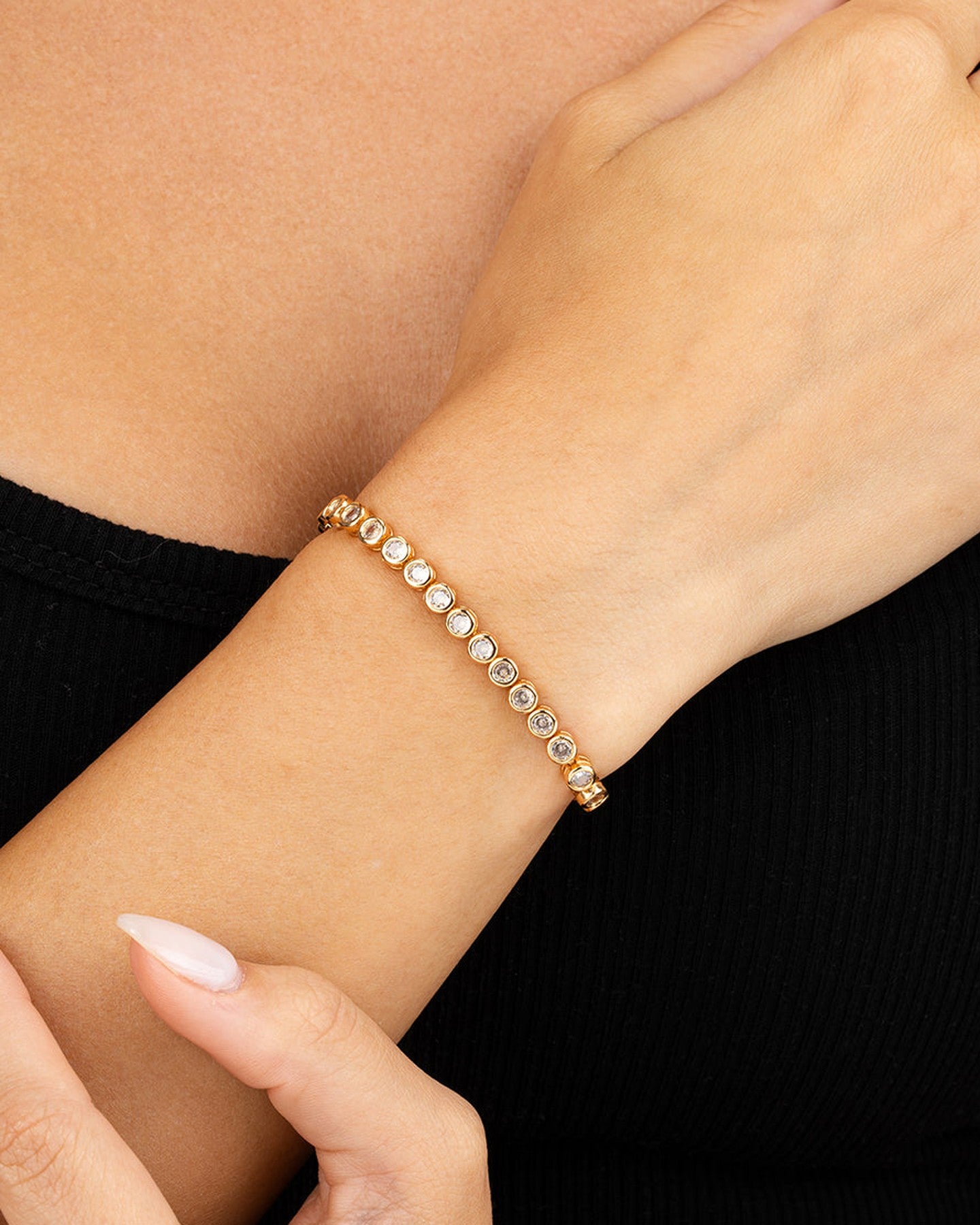 Helene Bezel CZ Tennis Bracelet worn on wrist