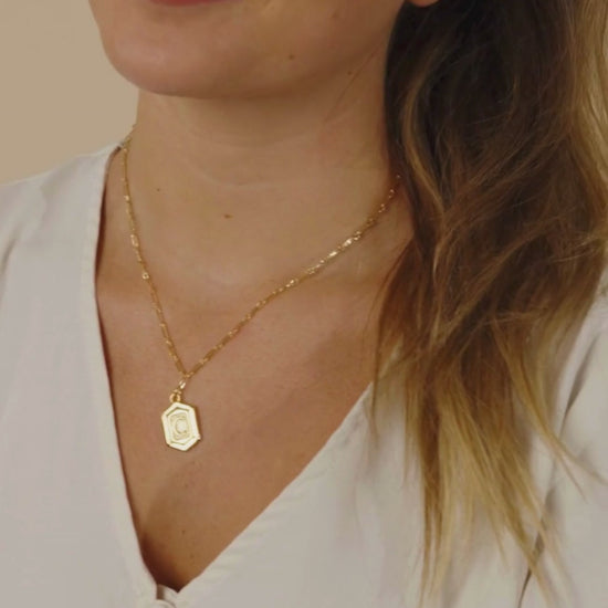 Woman Wearing Hexagon Tag Initial Pendant Necklace