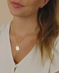 Woman Wearing Hexagon Tag Initial Pendant Necklace