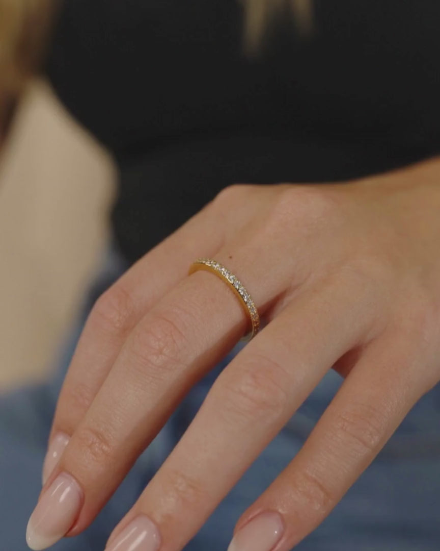 Woman Wearing Gold Thin CZ Band Ring